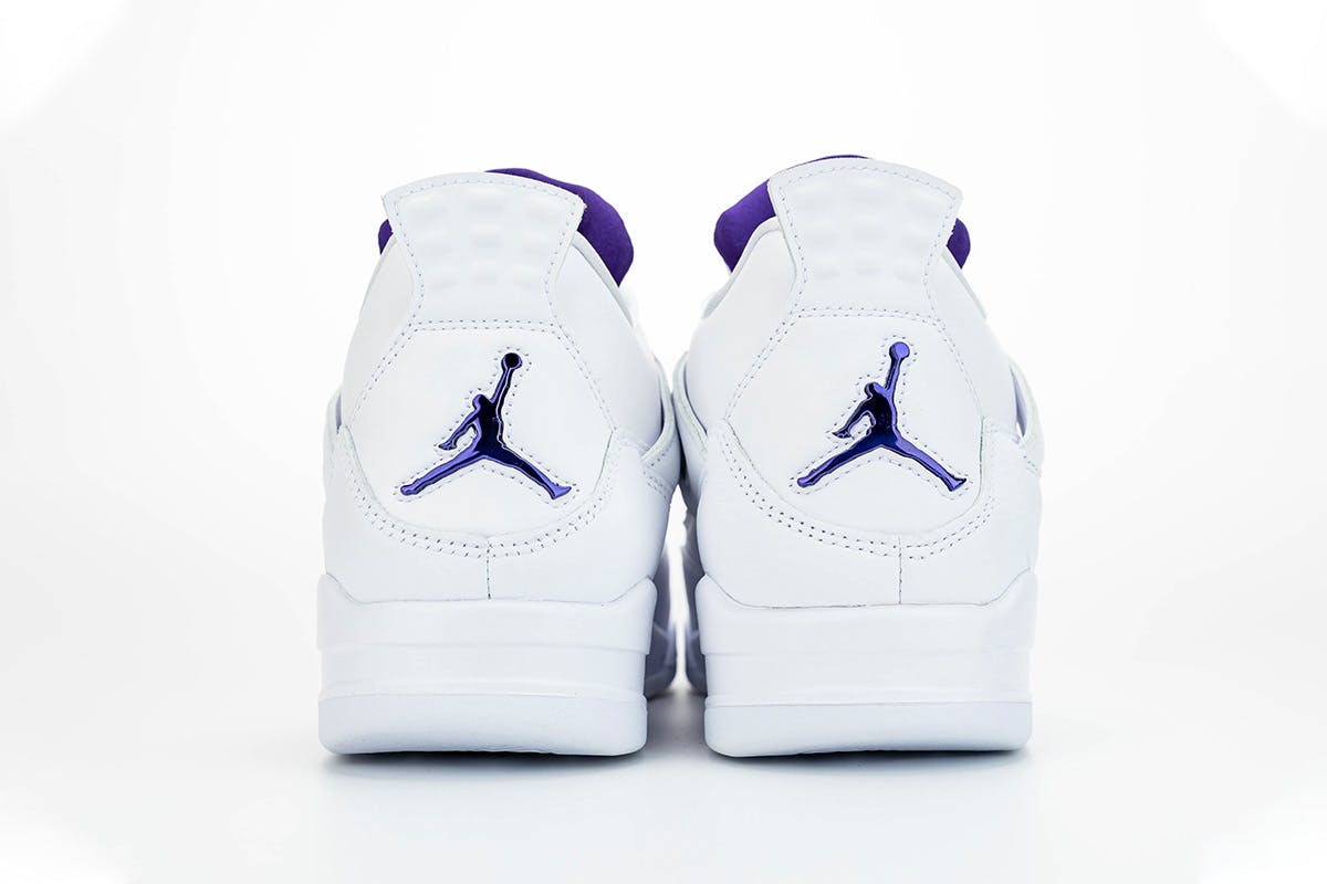 white jordans with purple